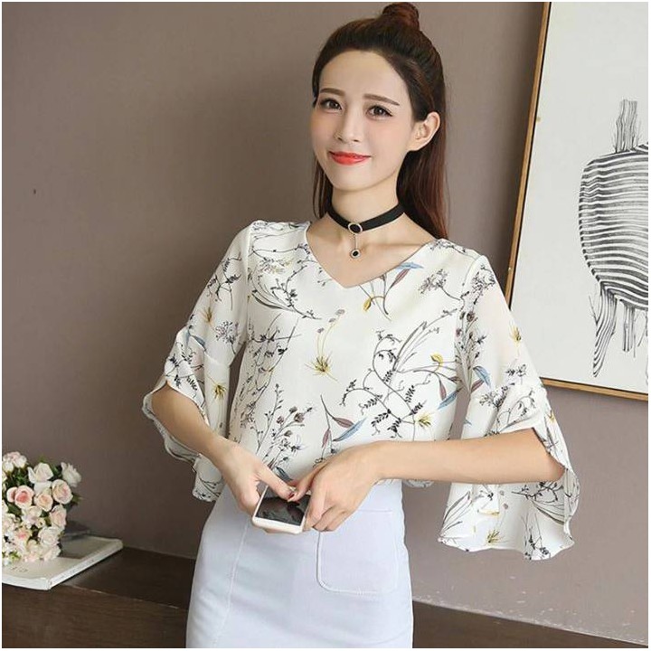 Top floral manches papillons