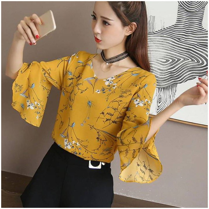 Top floral manches papillons