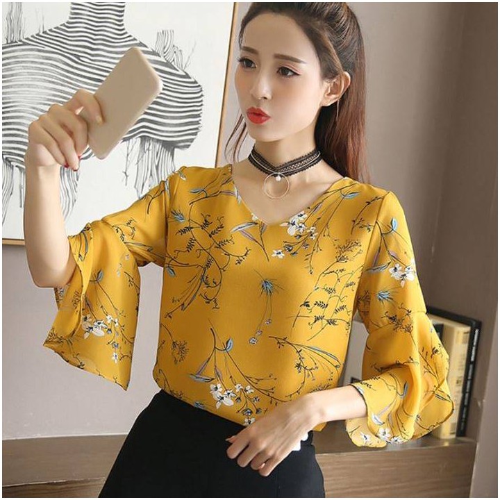 Top floral manches papillons