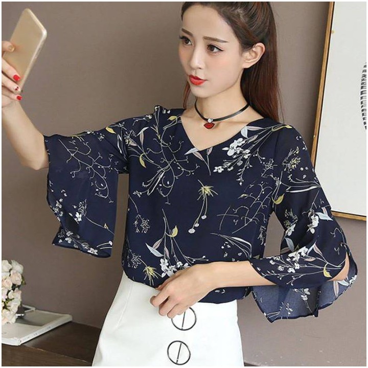 Top floral manches papillons