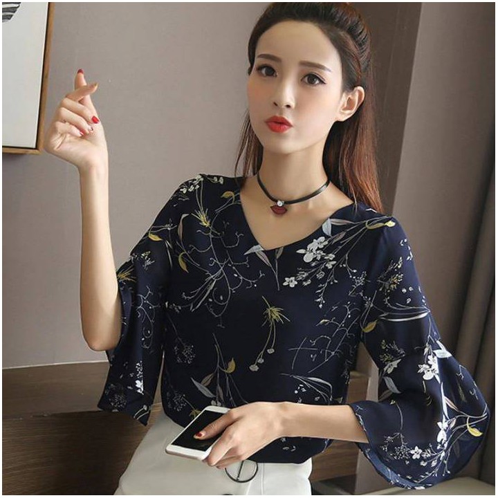 Top floral manches papillons