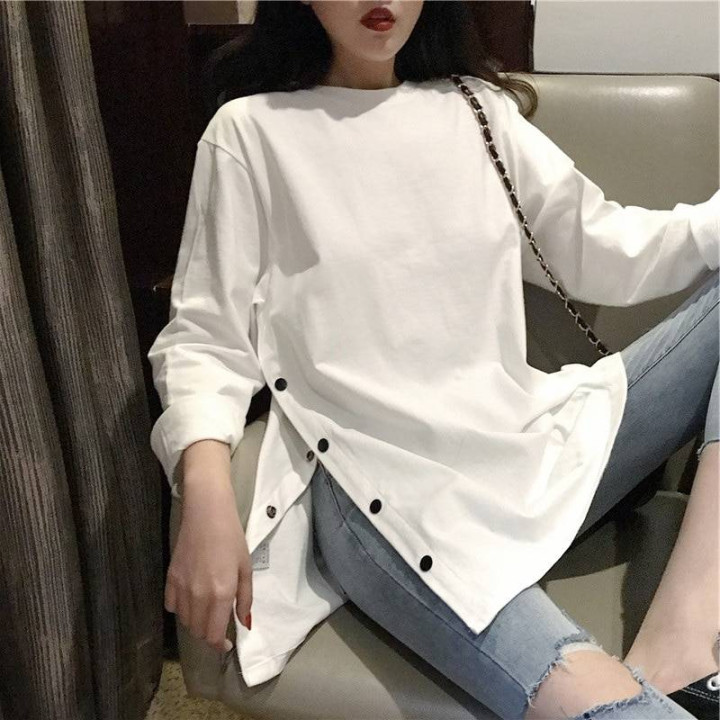 Pull avec fente de côté boutonné