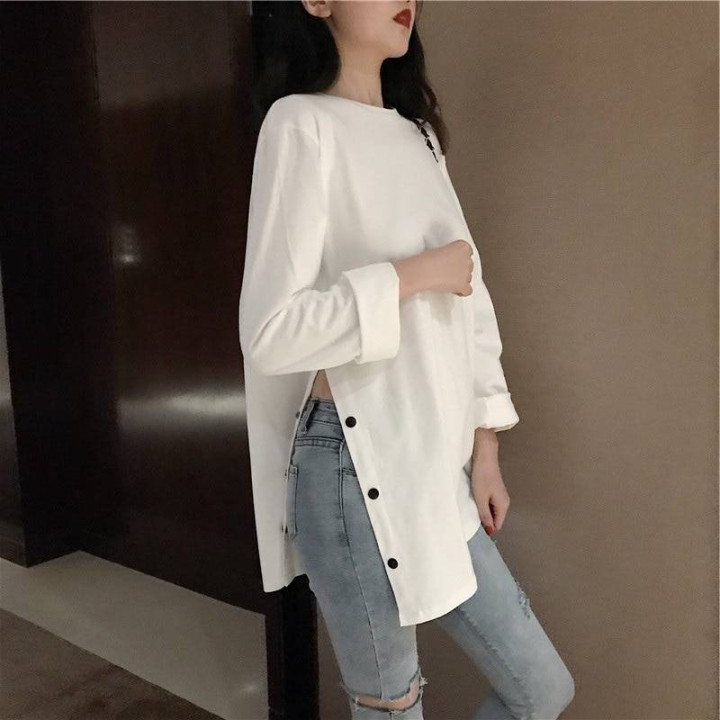 Pull avec fente de côté boutonné