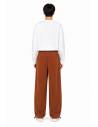 Pantalon coupe droite velours — porté de dos